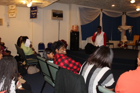 Young  Jr. Minister in training Mofik cheers everyone's heart at the Christmas Spectacular 2014 Event